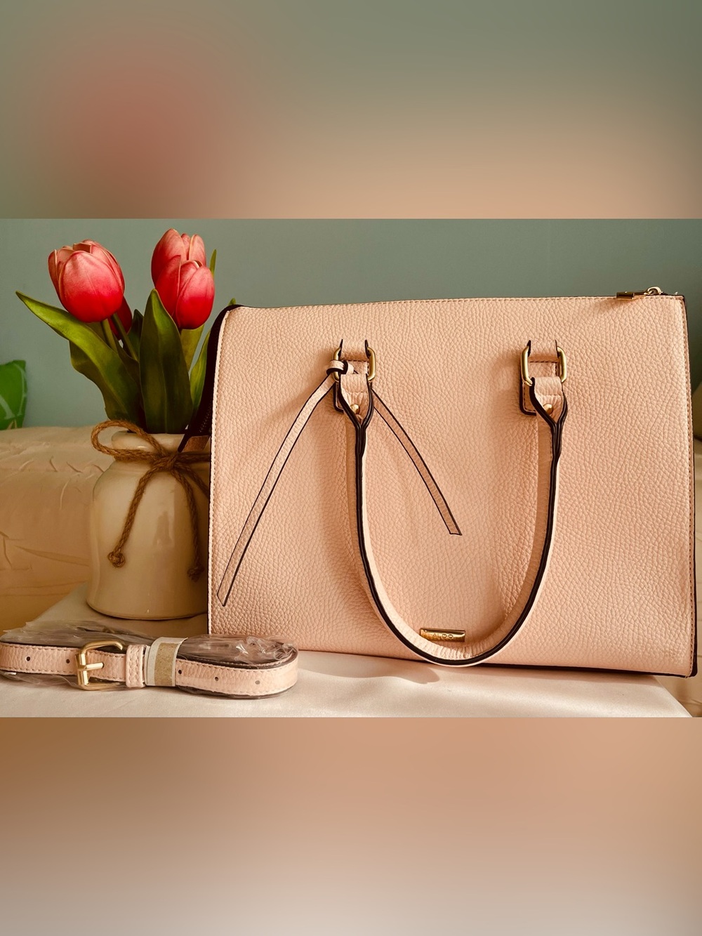 ALDO tote bag with textured faux leather, top zip closure & dual top handles.